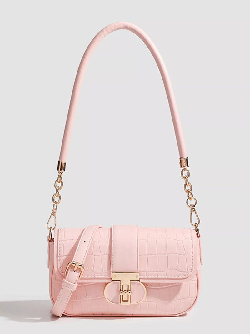 Textured pink flap shoulder bag front view