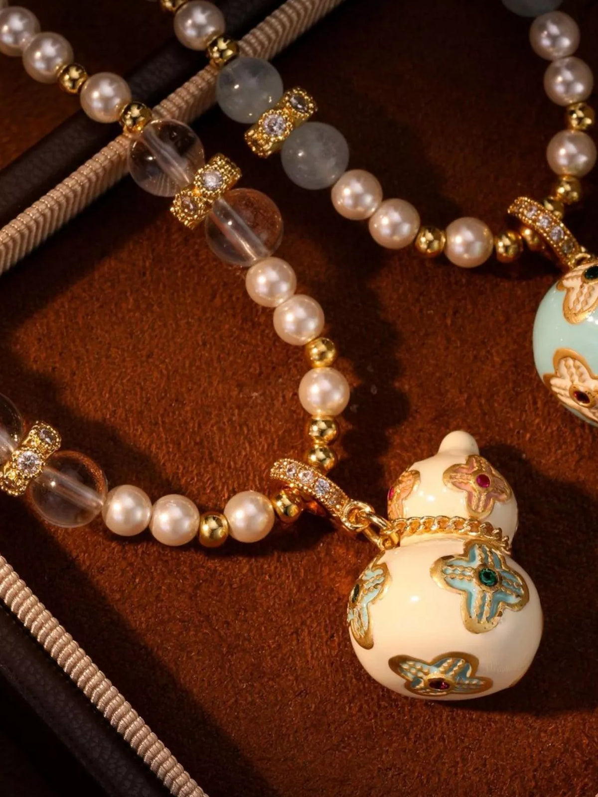 gold plated gourd pendant necklace styled on model