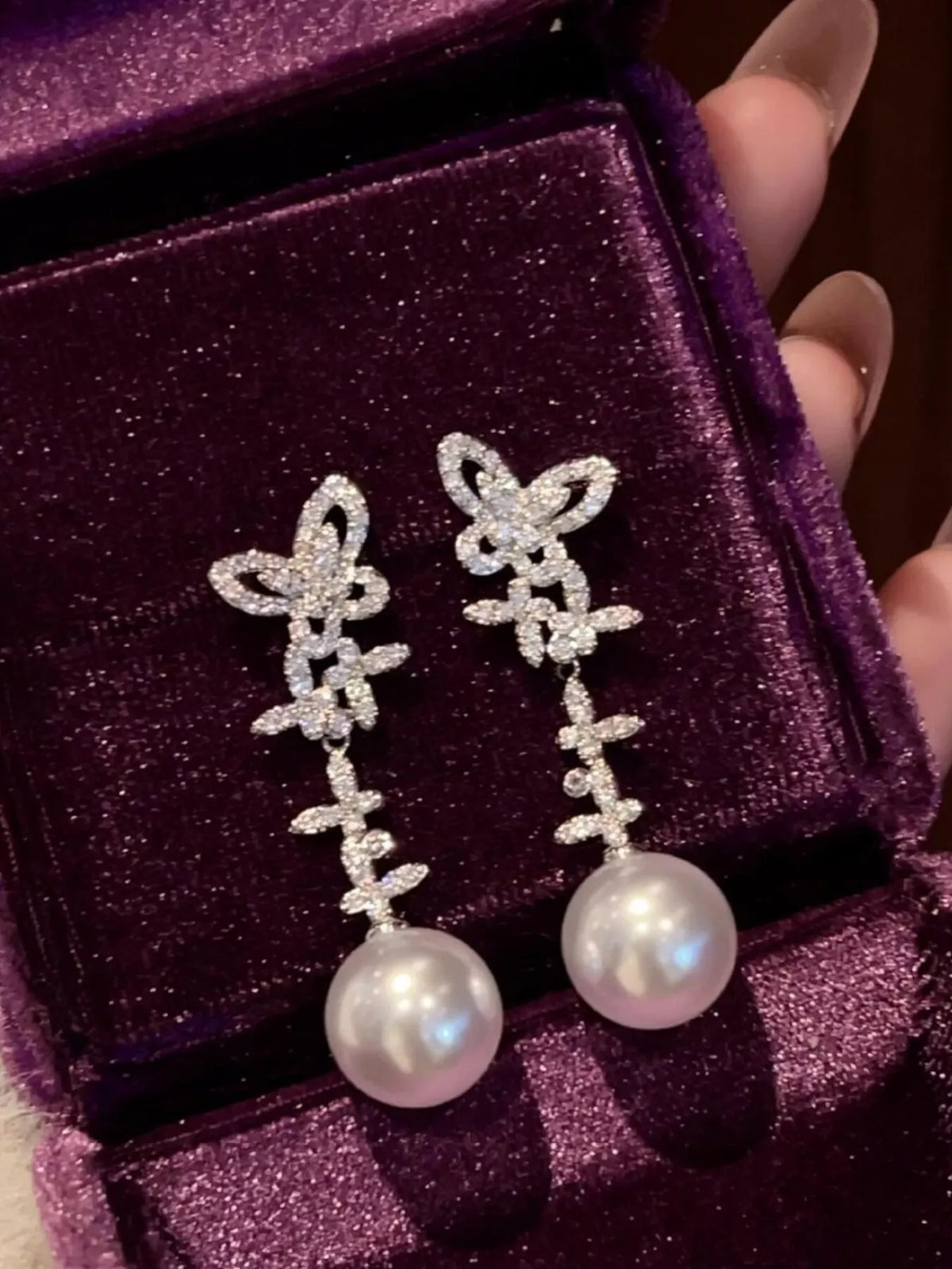 Pastel yellow butterfly pearl drop earrings