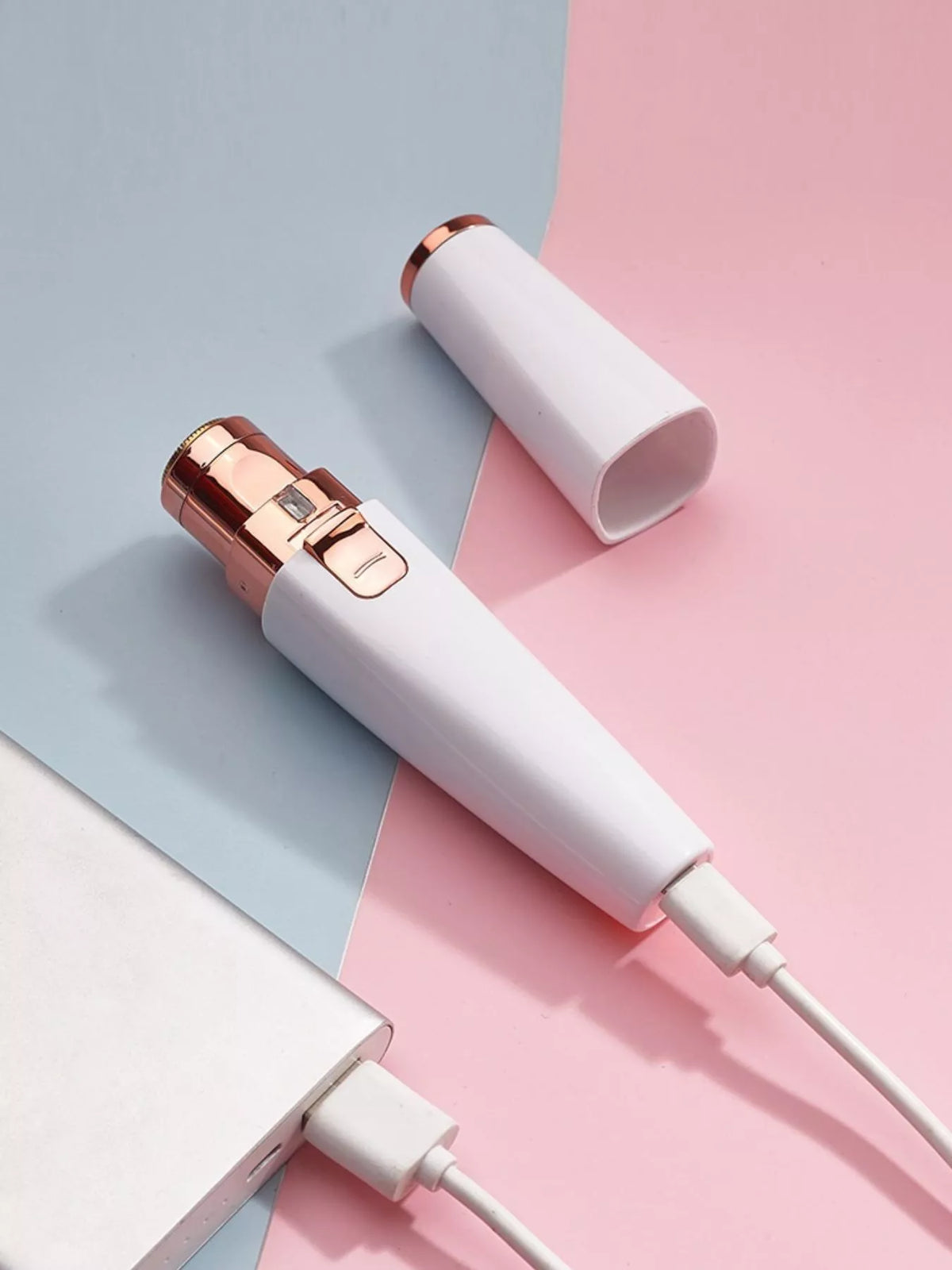 Epilator in use on skin