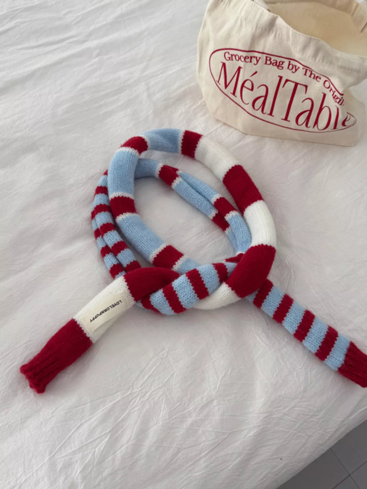 Warm knit scarf shown at full length