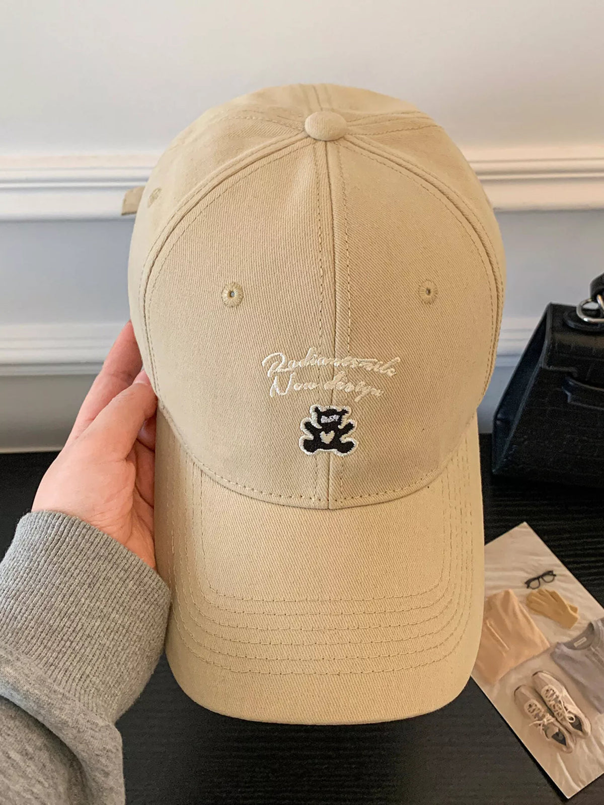 Back view of the one size embroidered cotton cap