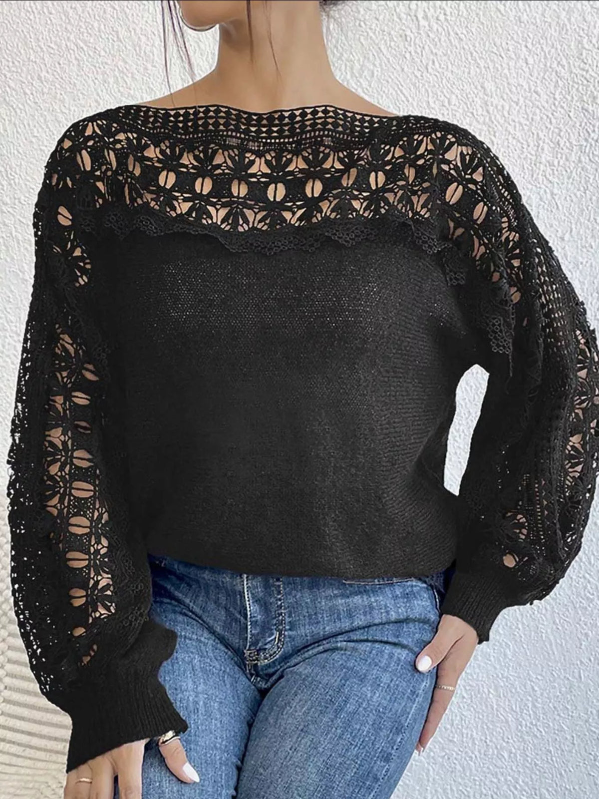 Black crochet sweater close up