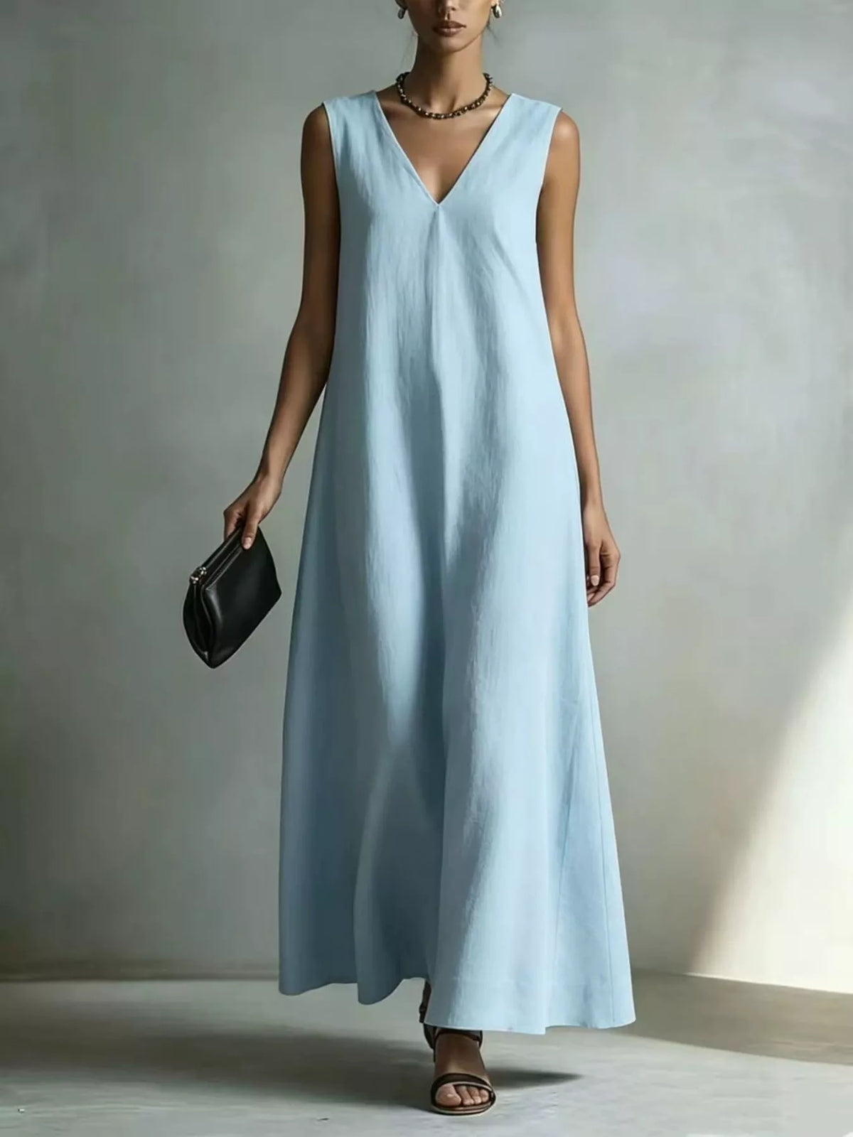 Side view of the maxi dress showing the drape of the skirt
