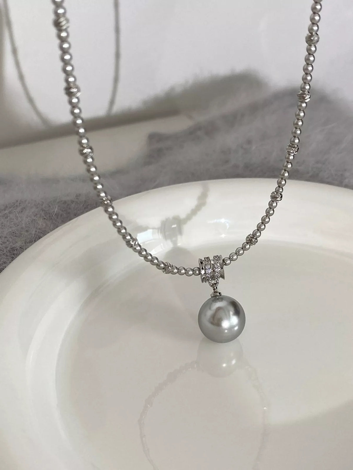 pearl pendant necklace angle view