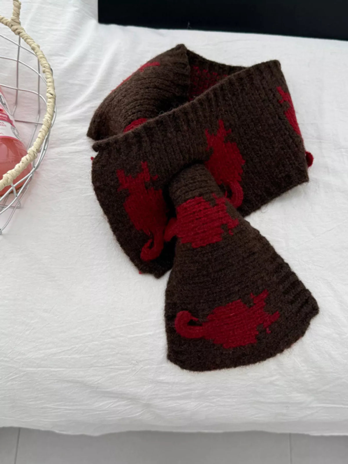 Dark brown knitted scarf detail