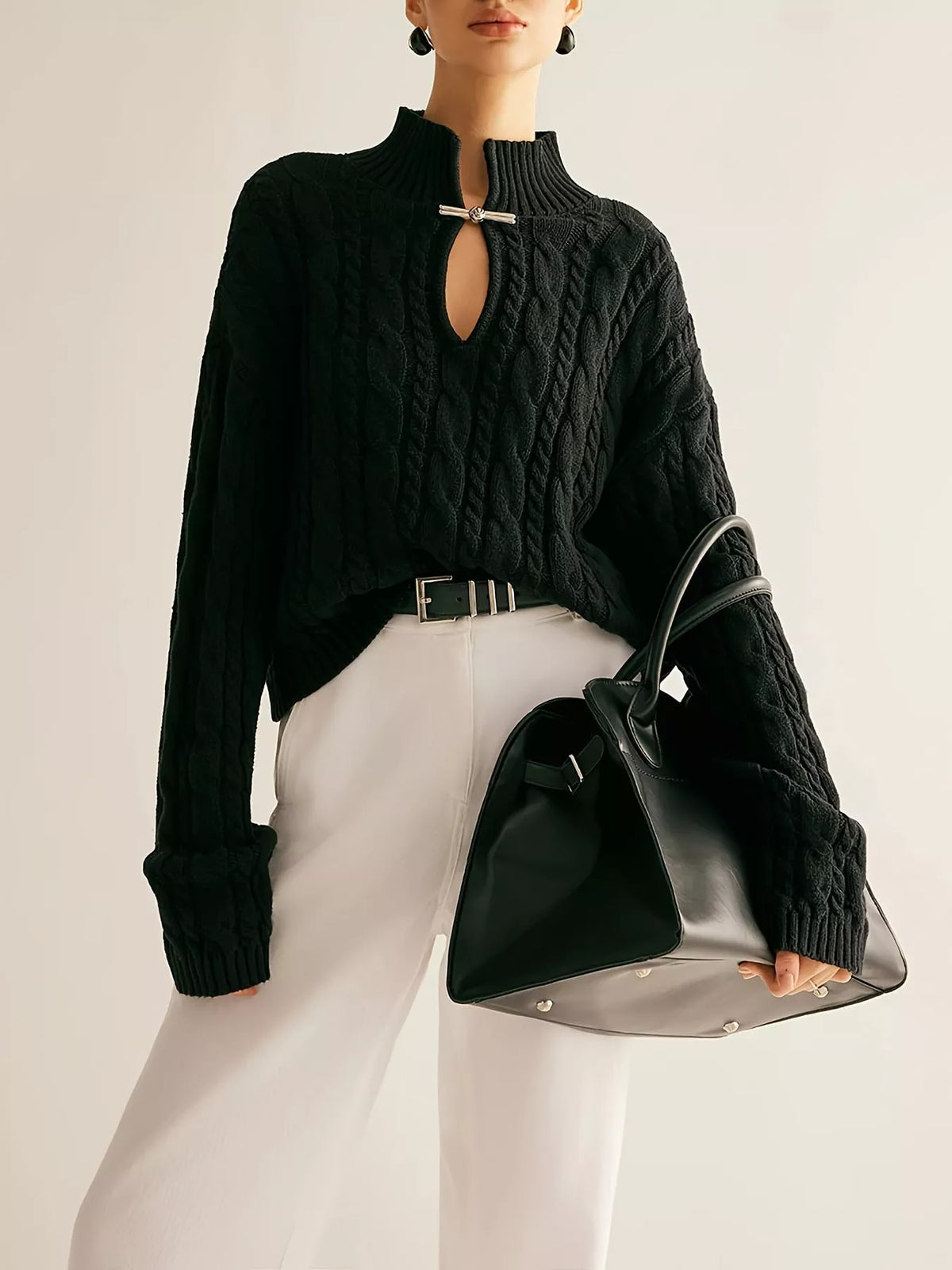 Cable knit sweater keyhole cutout detail in black