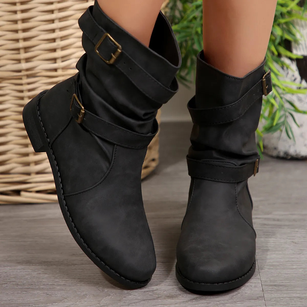 Mid calf buckle strap boots side profile