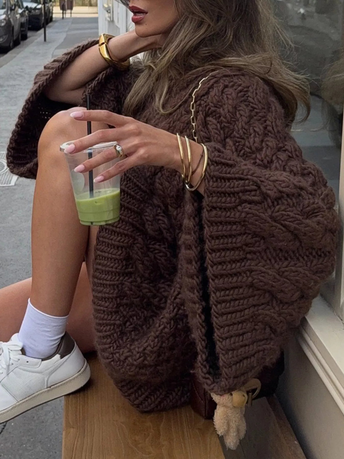 Cable knit round neck sweater, button detail