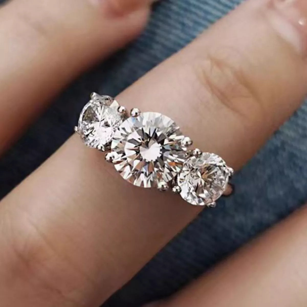 Moissanite sterling silver ring shown from the side