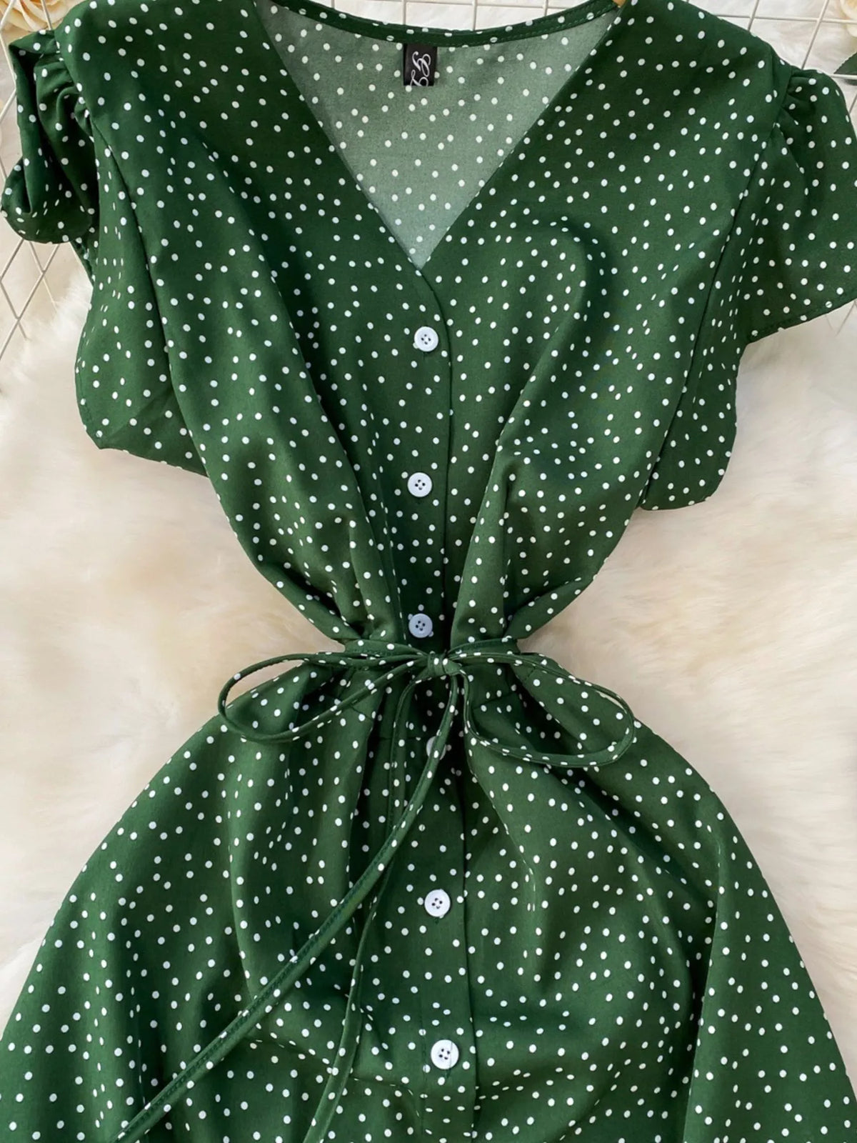 Green polka dot button up maxi dress side view