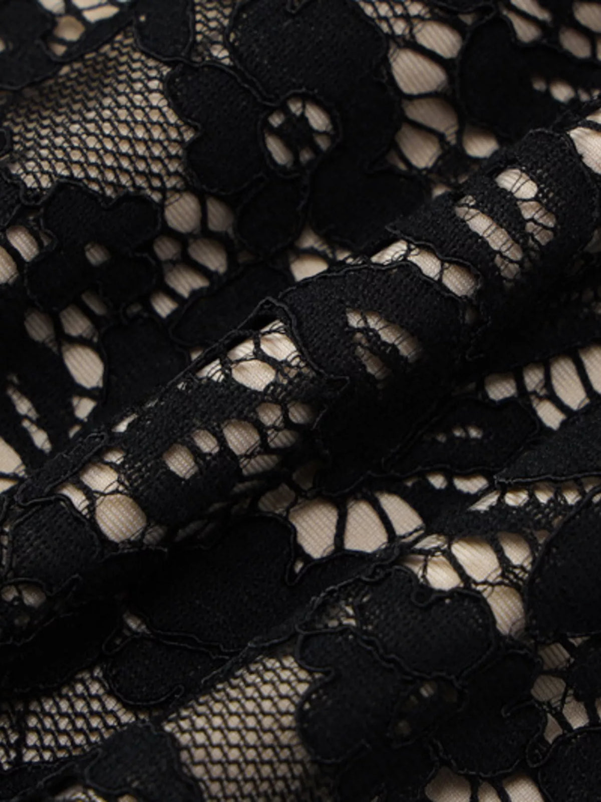 Lace mini dress fabric texture detail