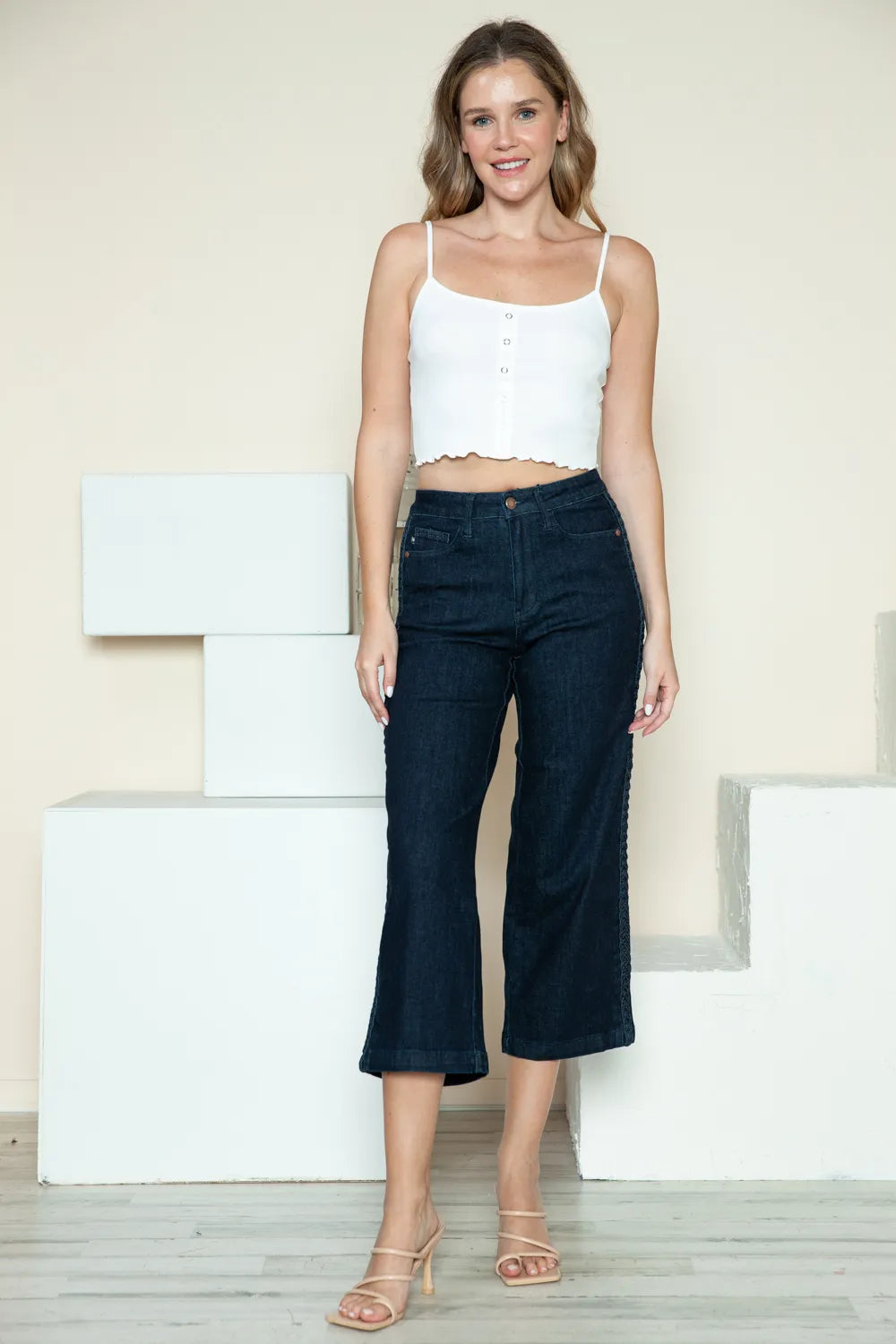 Back pocket detail on dark wash wide leg jeans