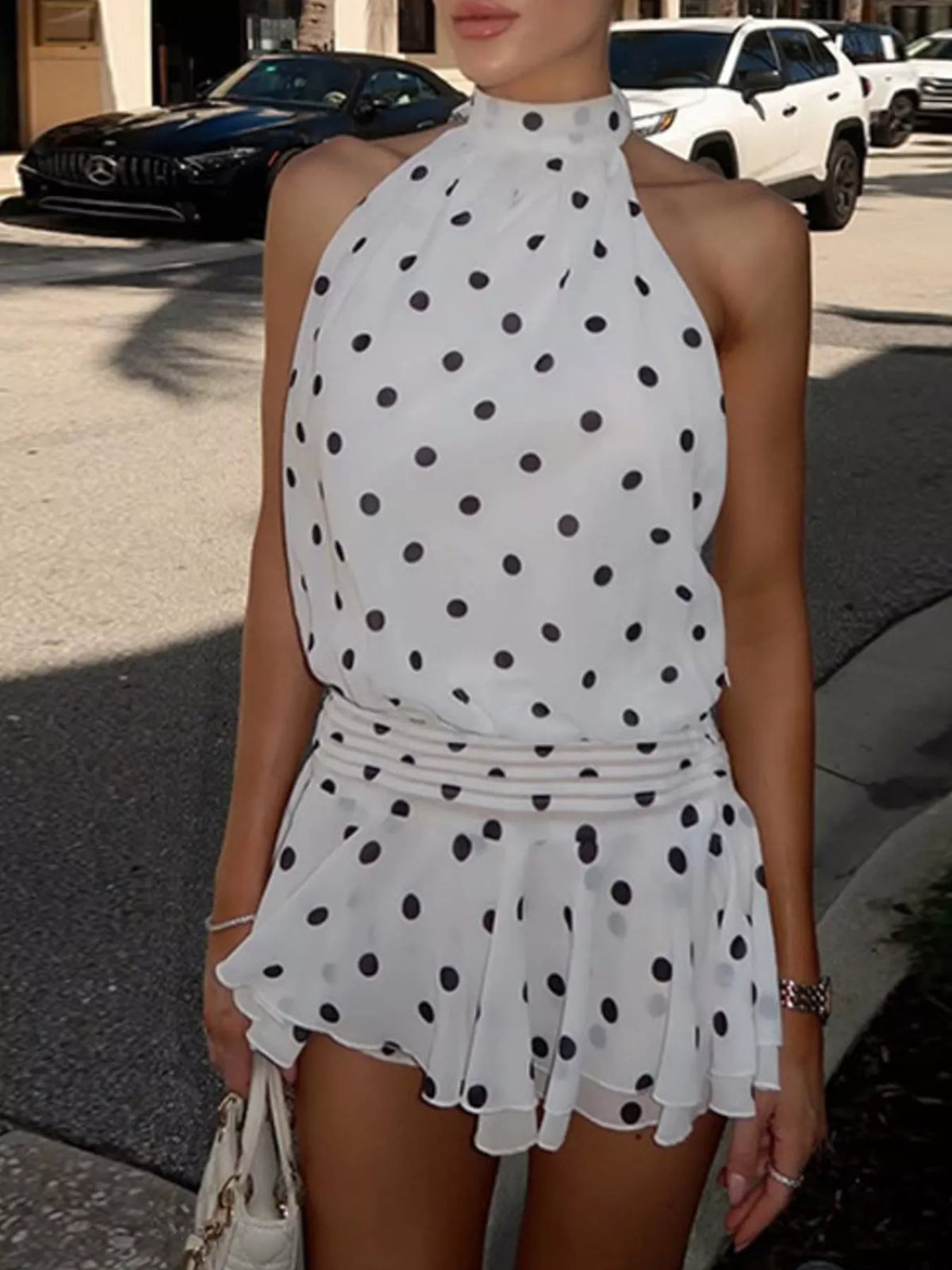 Side view of the white polka dot ruffle dress