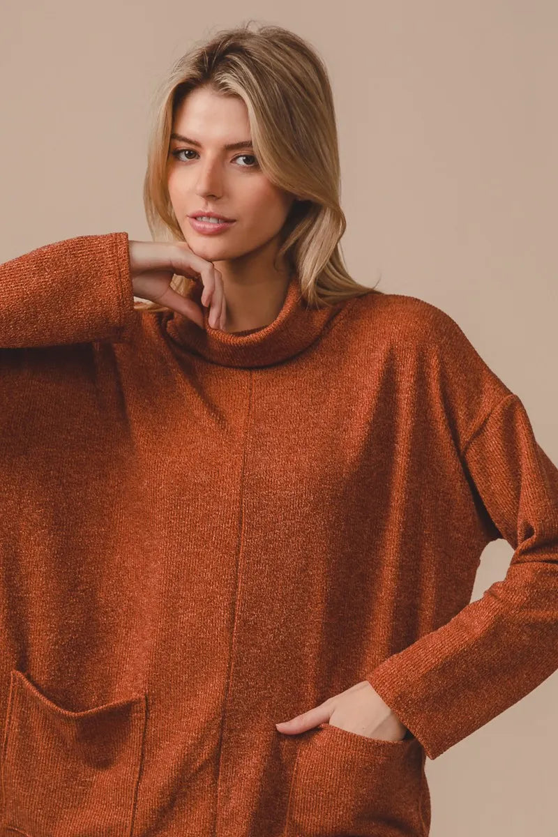 Ribbed Double Pocket Turtleneck Sweater in Rust on model