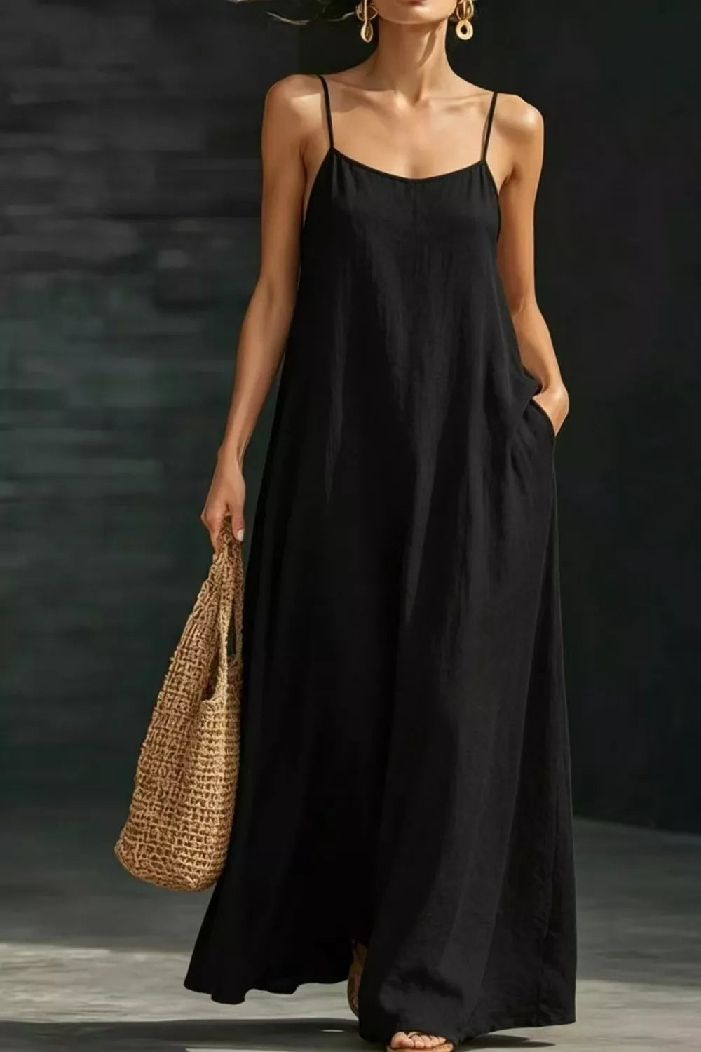 Black sleeveless loose fit maxi dress front view