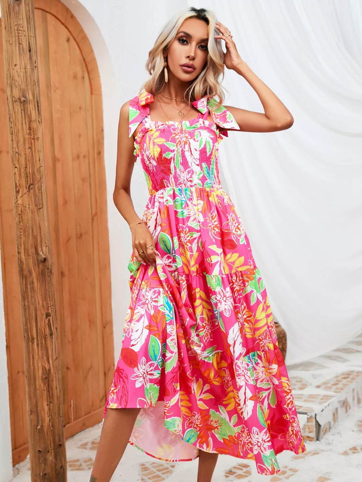 Tropical print smocked tie strap dress back view