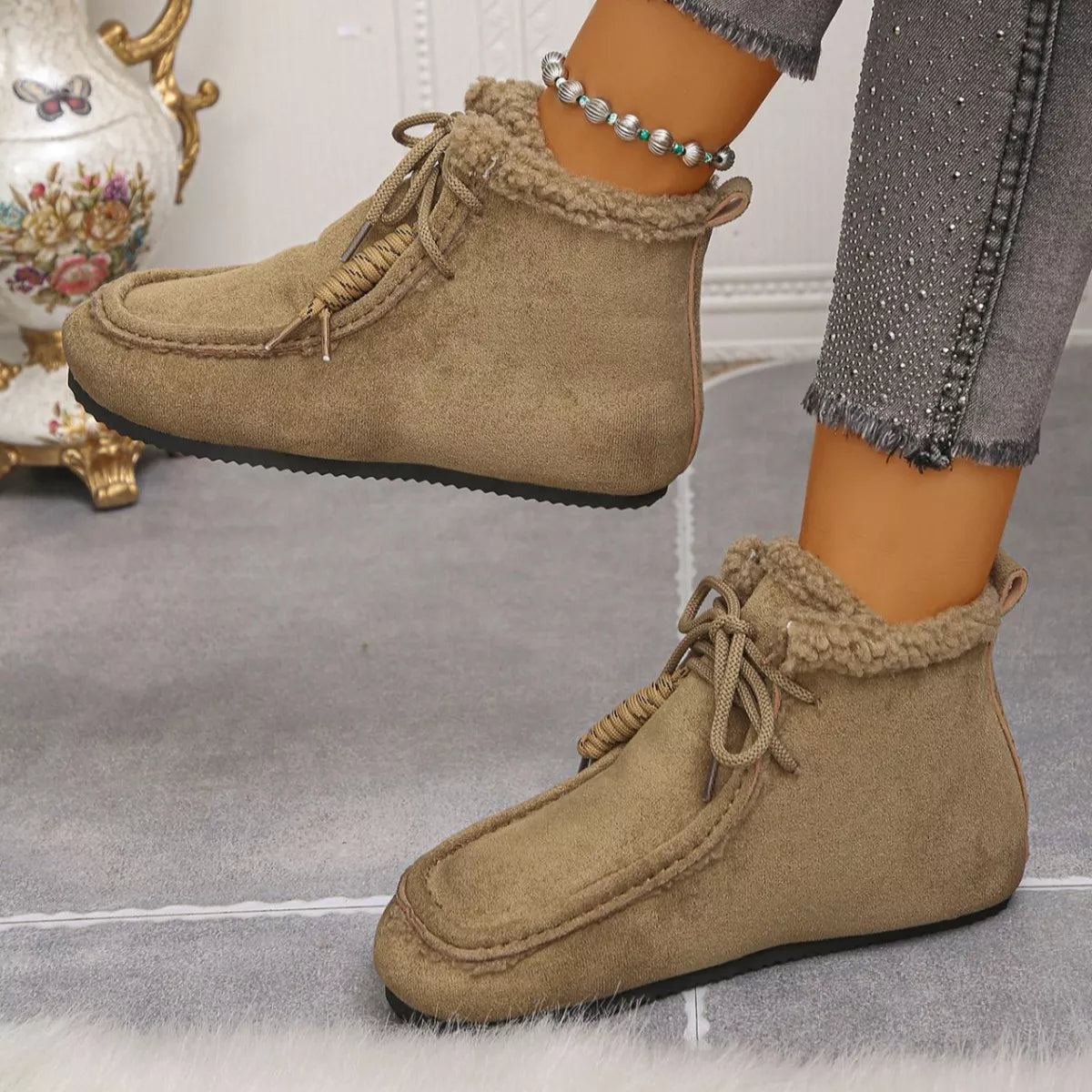 Lace up flat ankle boots top down view