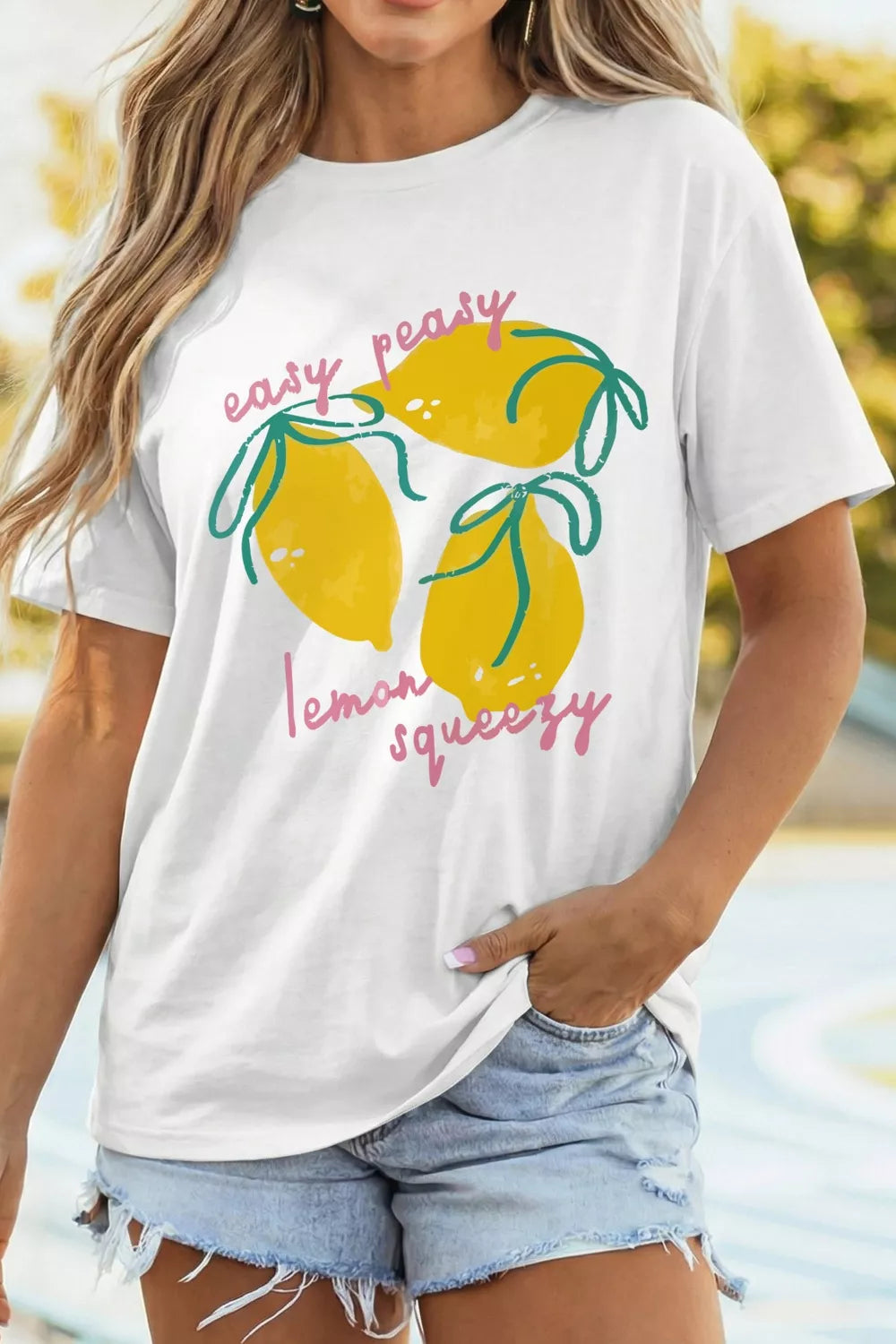 White Easy Peasy Lemon Squeezy graphic tee angled view
