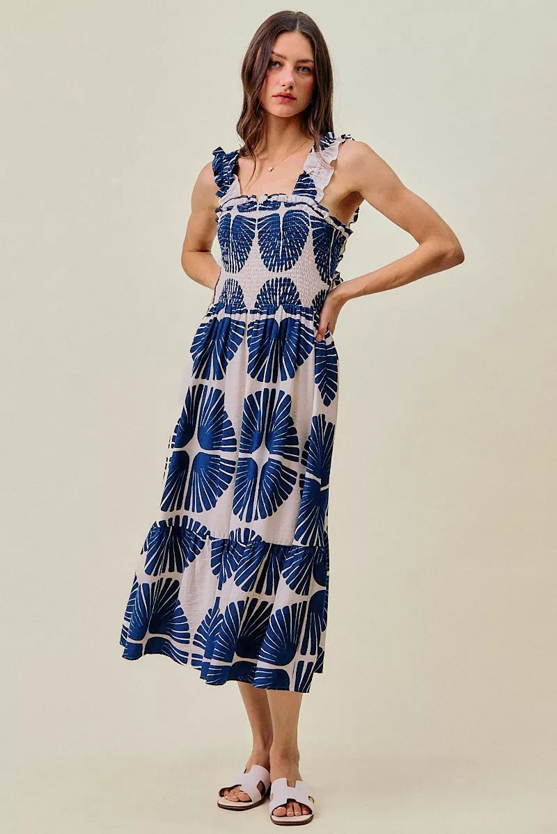 Navy abstract print smocked bodice tiered midi dress front view