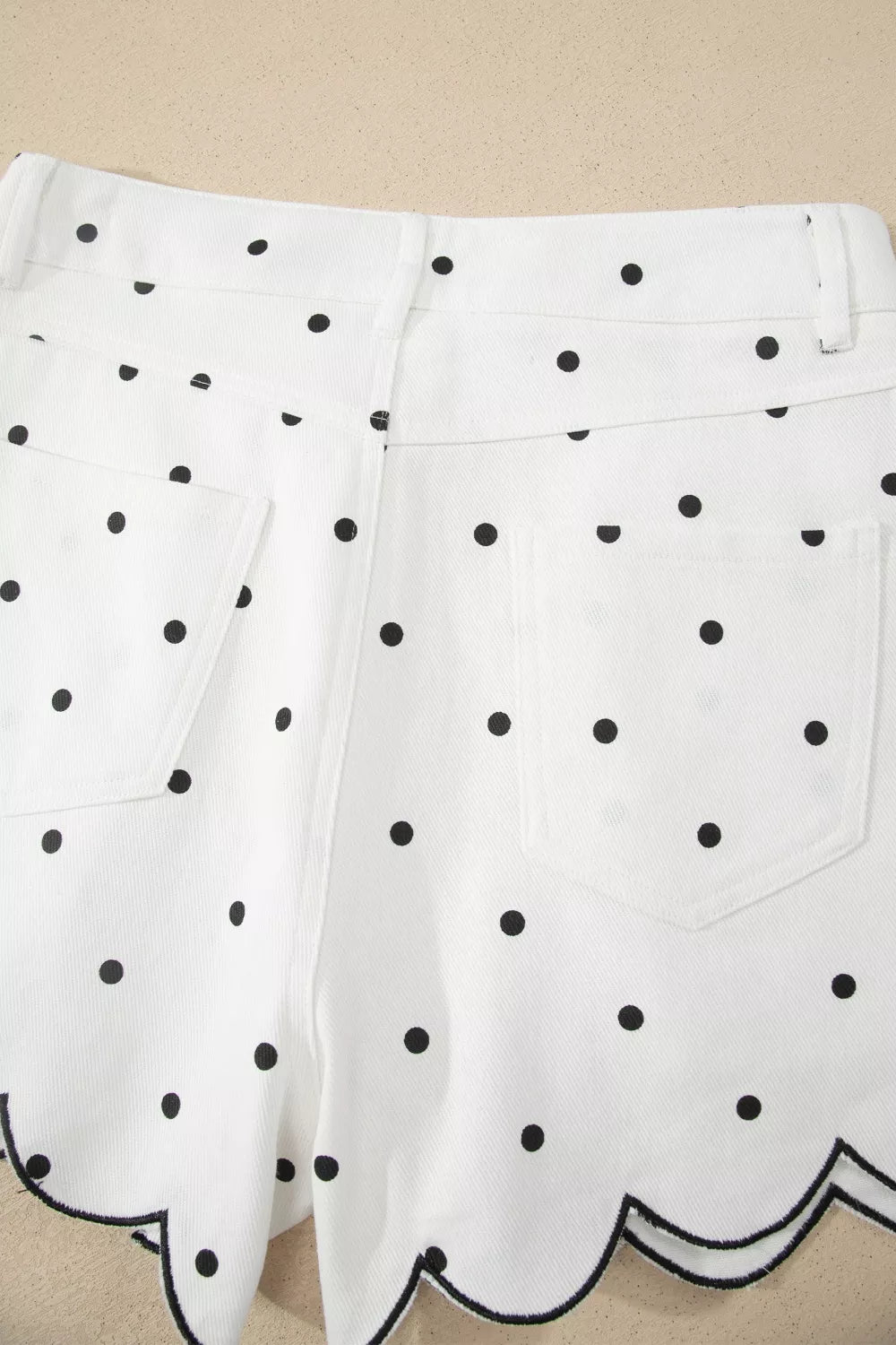Polka dot shorts hem curve detail