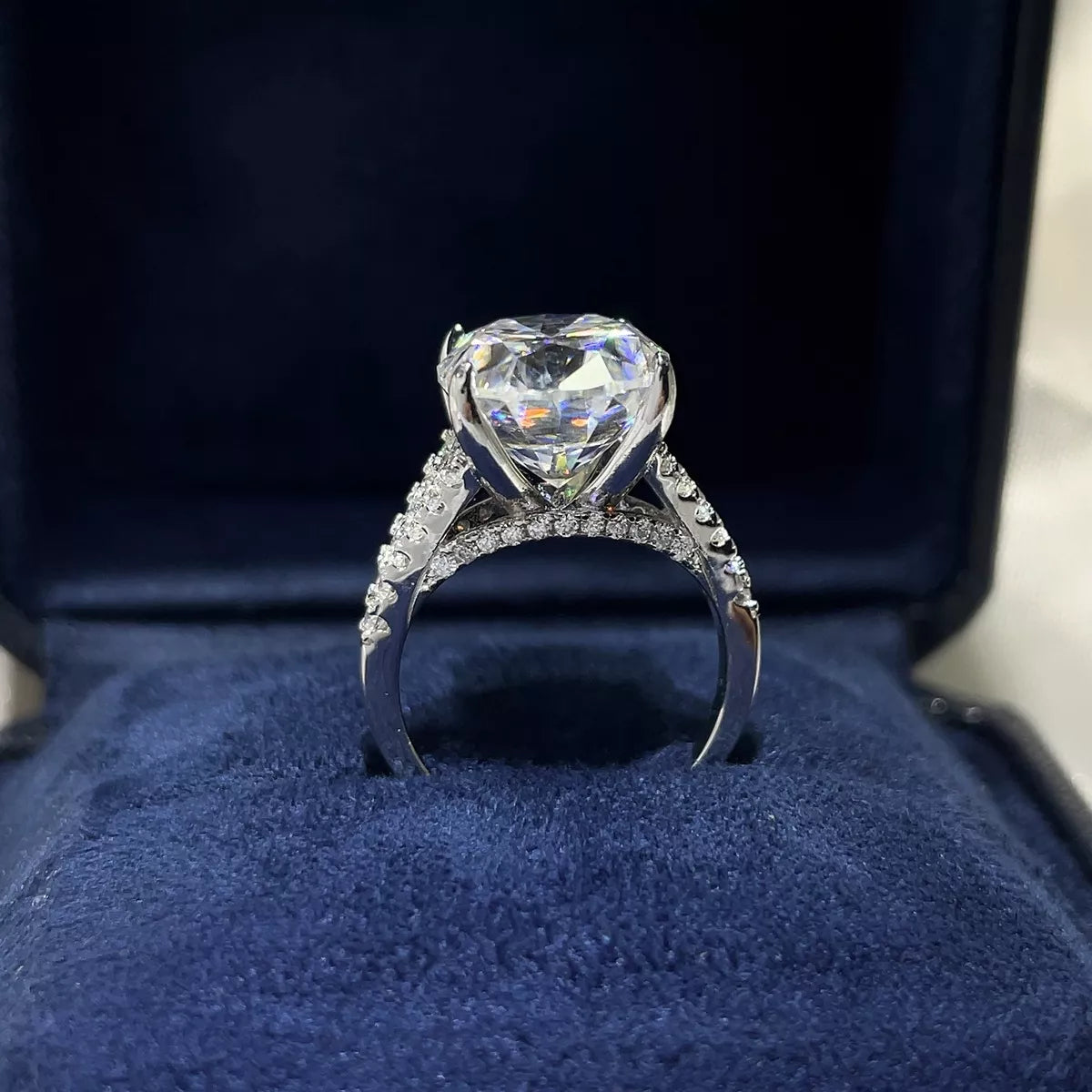 Close up of the brilliant cut moissanite stone and silver setting