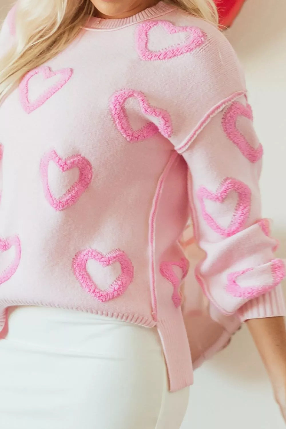 Heart shape bubble sleeve baggy sweater in blush pink fabric detail