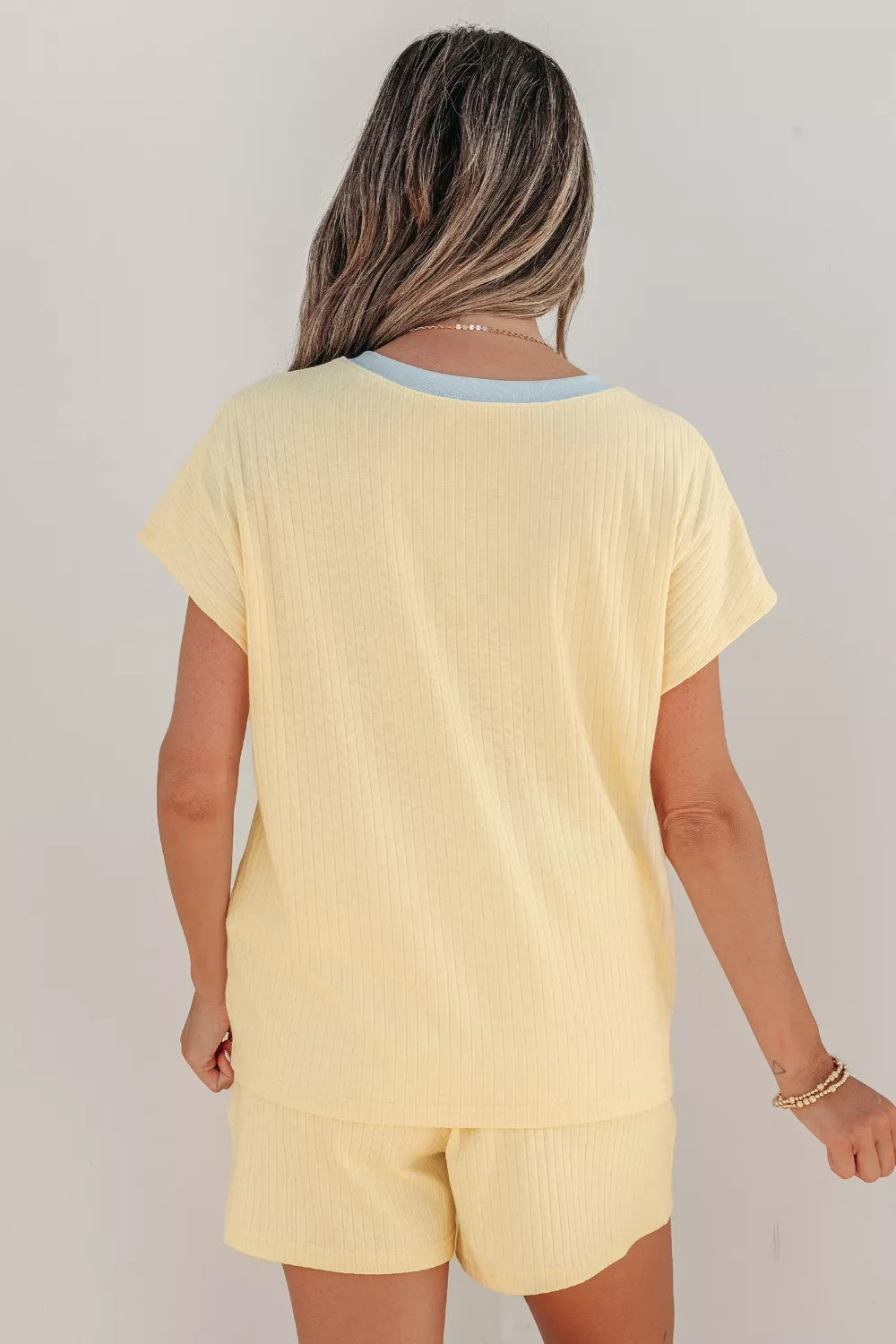 Pastel yellow coordinated ribbed short set styled