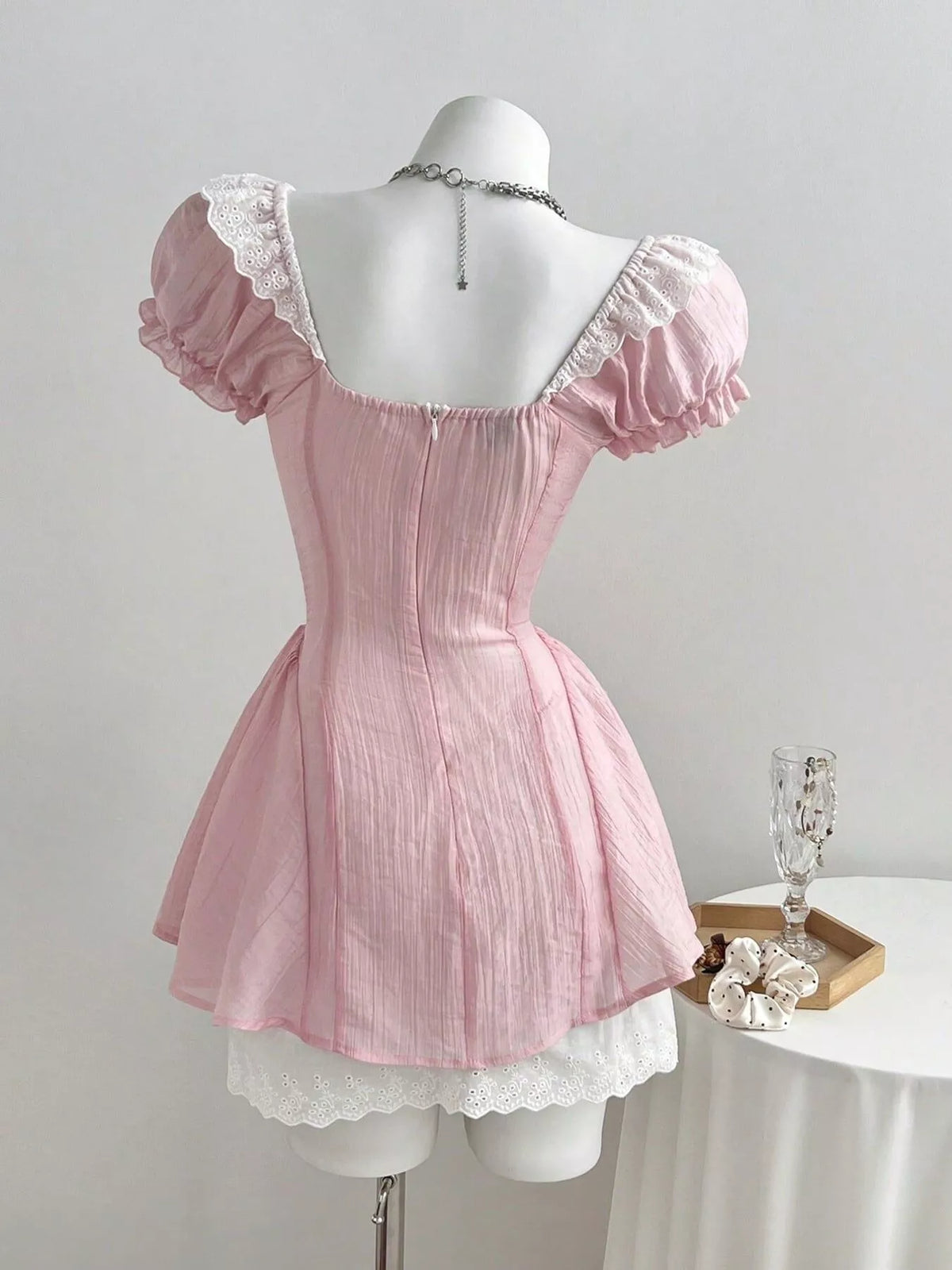 Back view of the pink cap sleeve dress