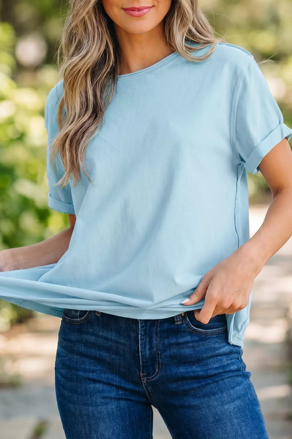 Back view of light blue round neck tee
