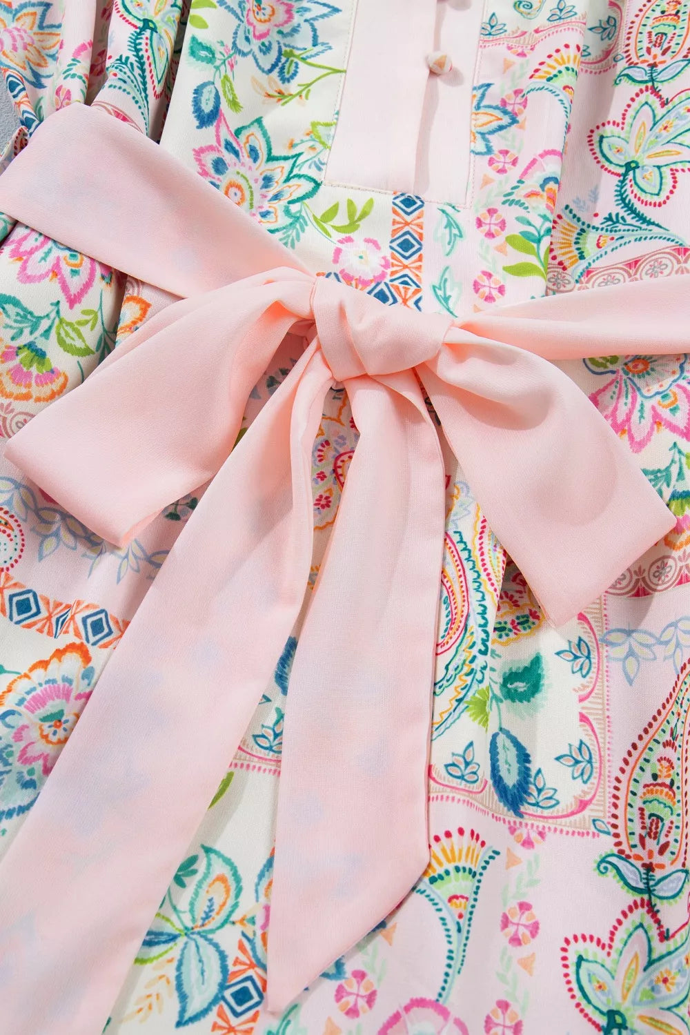 Blush pink floral print belted mini dress fabric detail