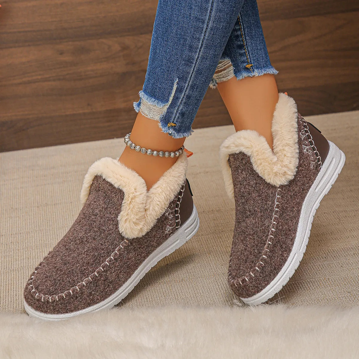 Fleece lined round toe ankle boots pair styled together