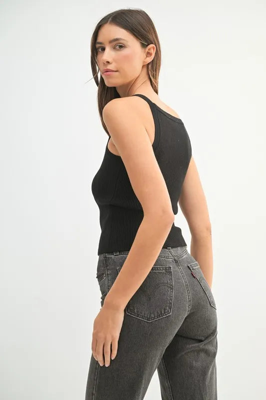 Close up of ribbed knit texture on a black tank top