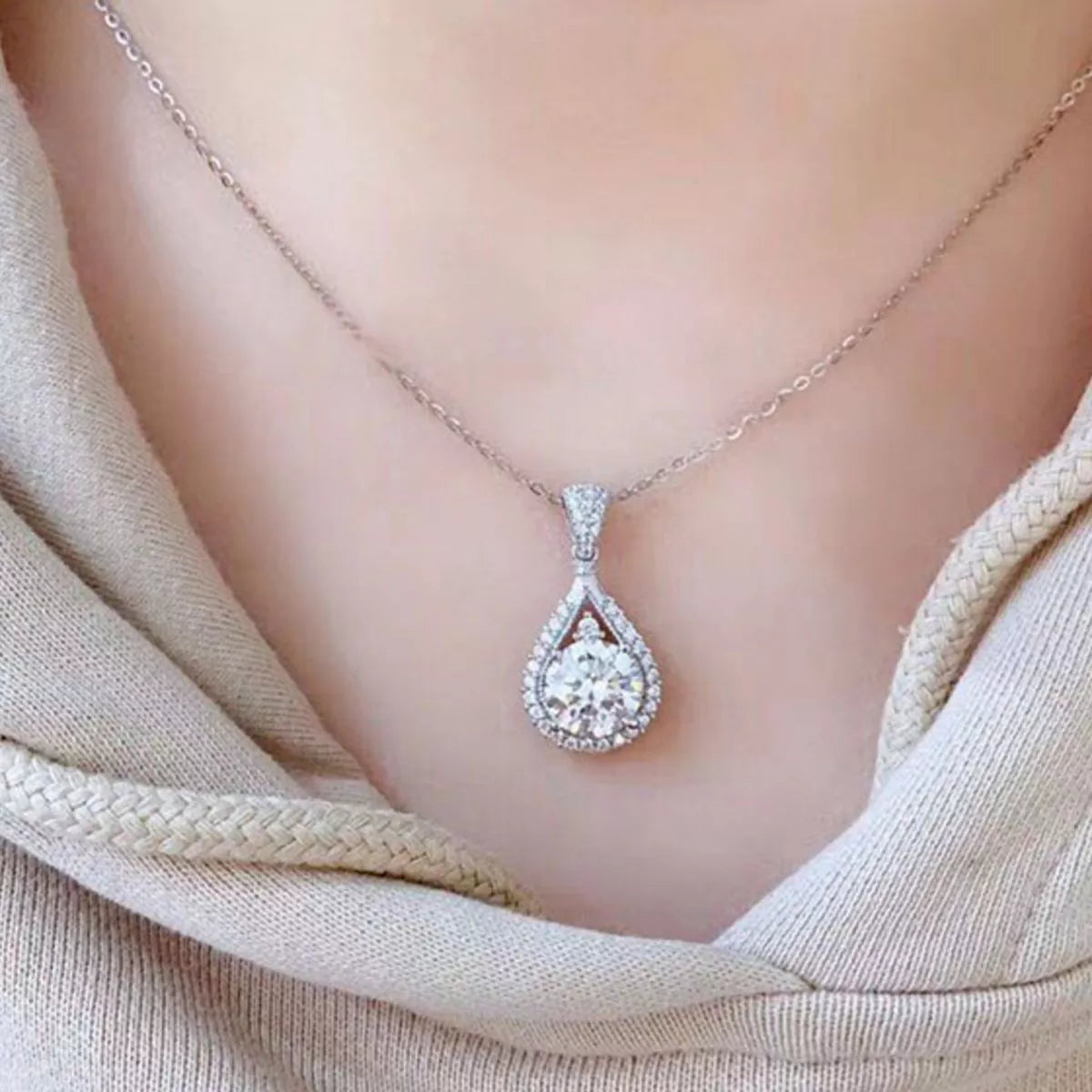 Teardrop necklace shown worn at the collarbone