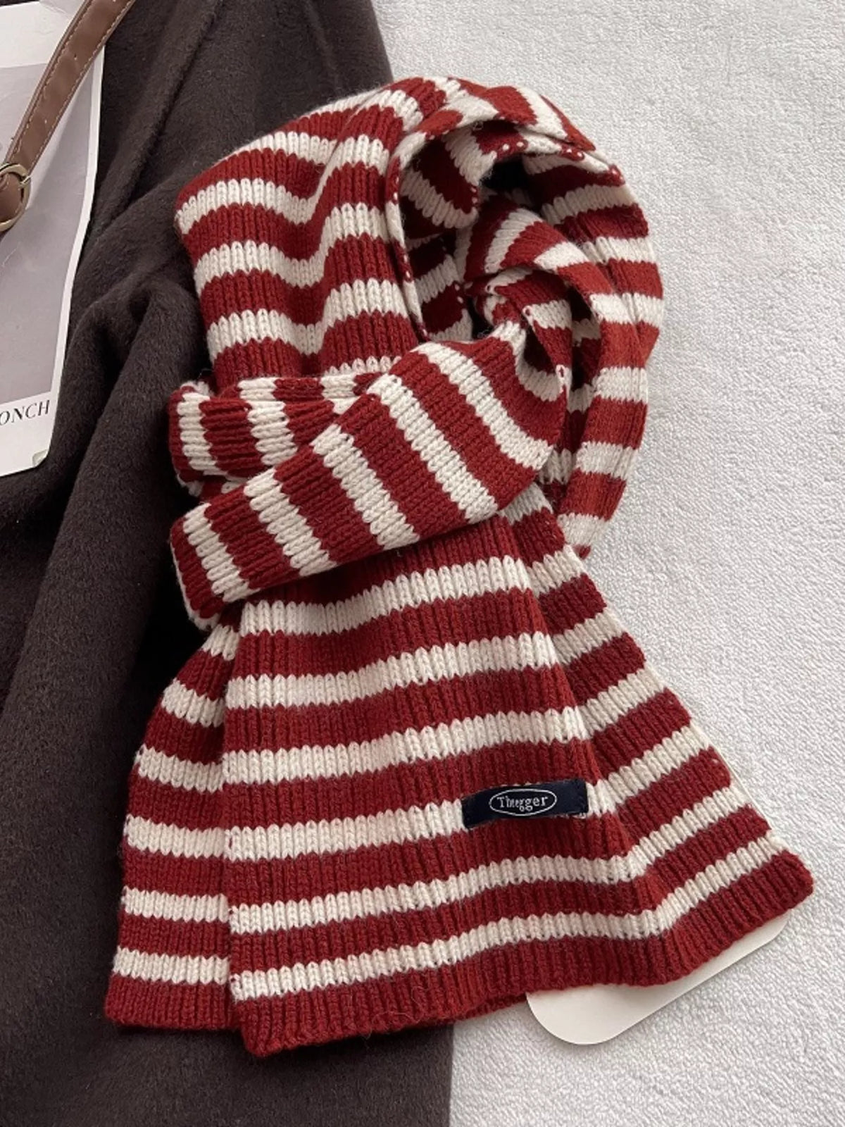 Wool striped knitted winter scarf front drape
