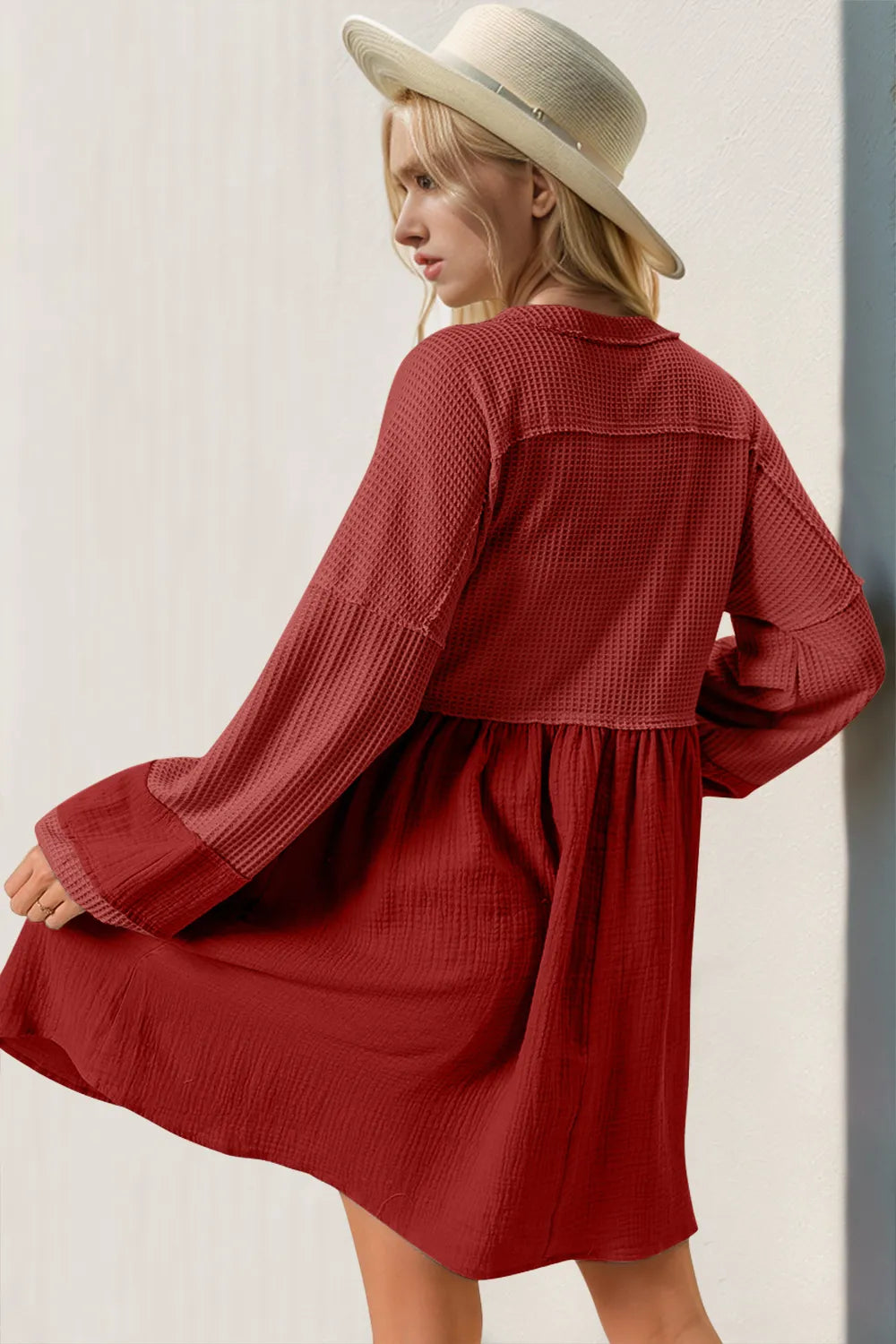 Half button V-neck detail on red waffle knit mini dress