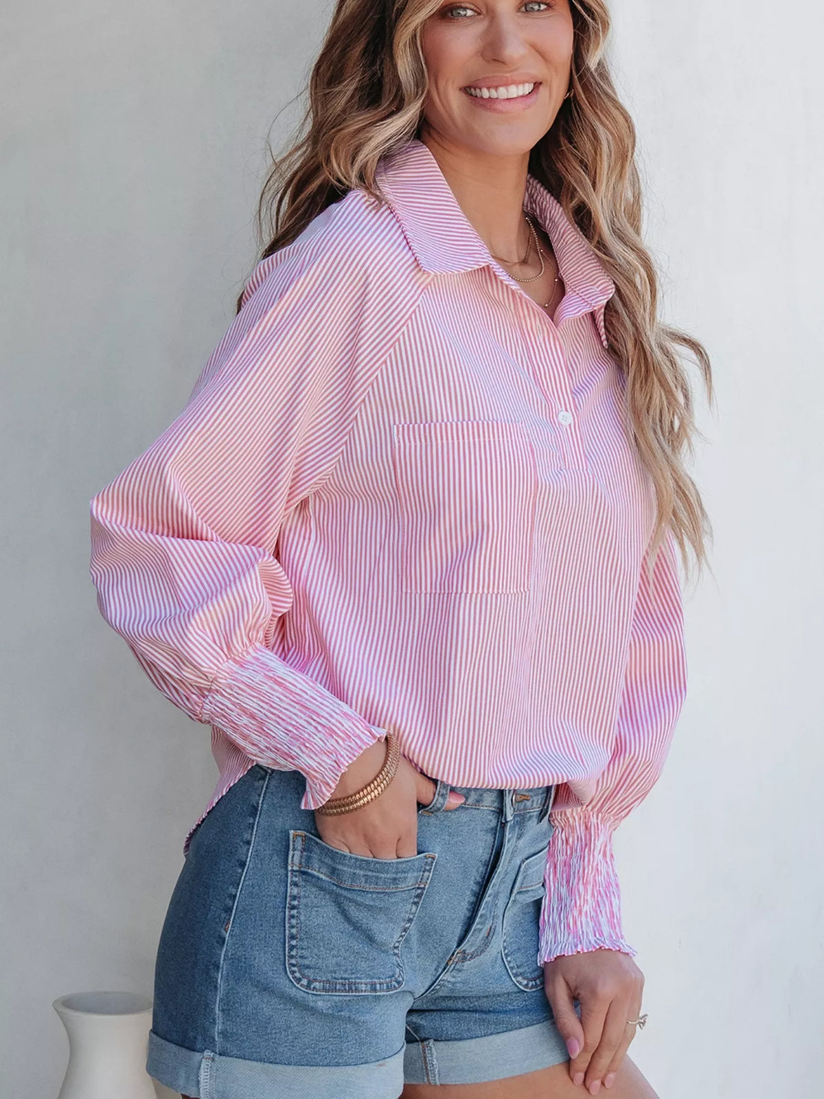Side view of the pinstripe blouse