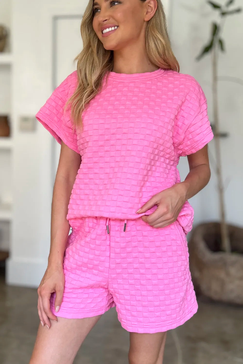 Back view of the tee and shorts outfit set
