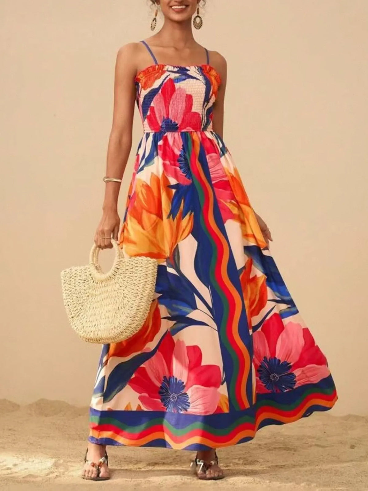 red and white smocked spaghetti strap printed maxi dress front view