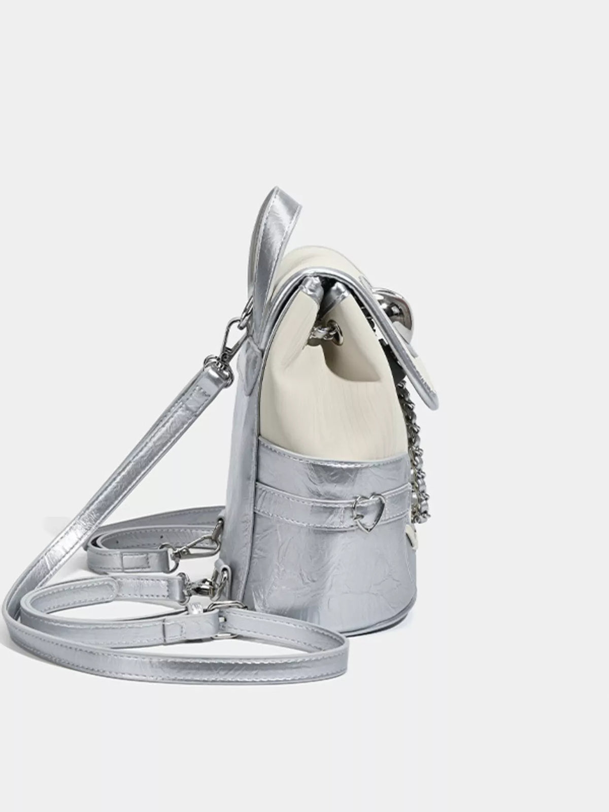 Heart flap mini backpack flat lay
