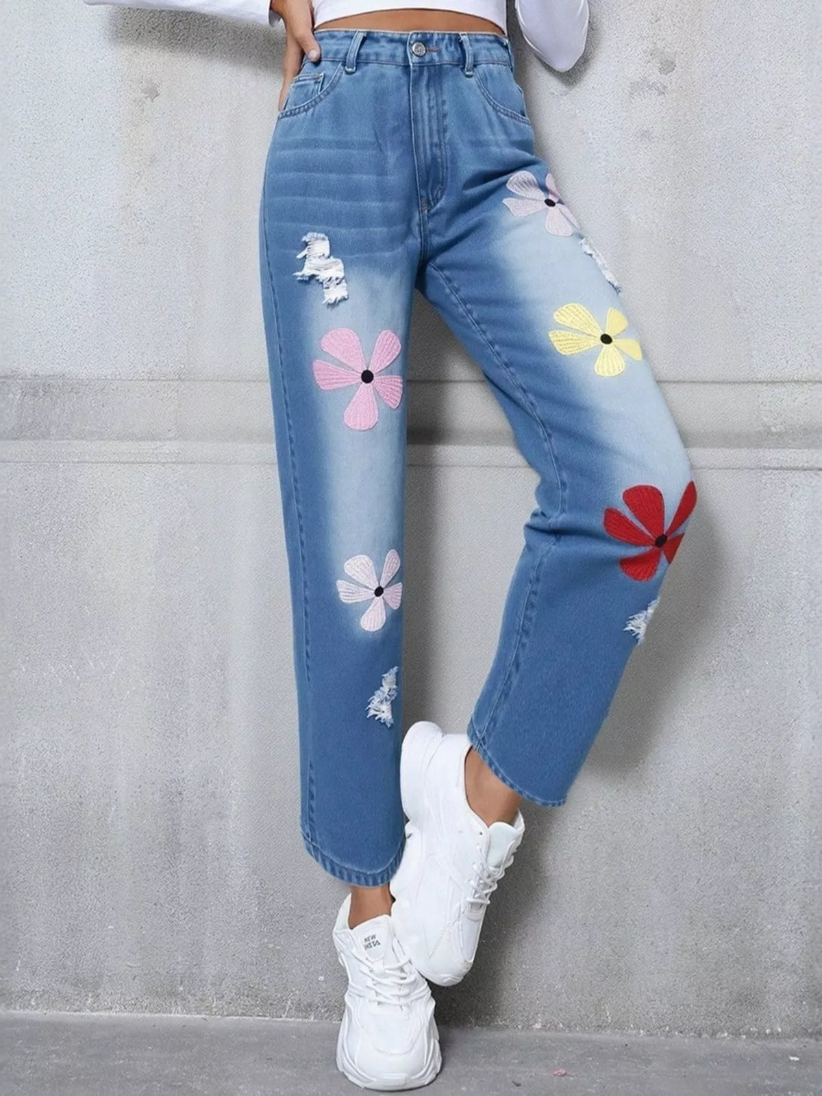 Floral embroidered high waist jeans front view