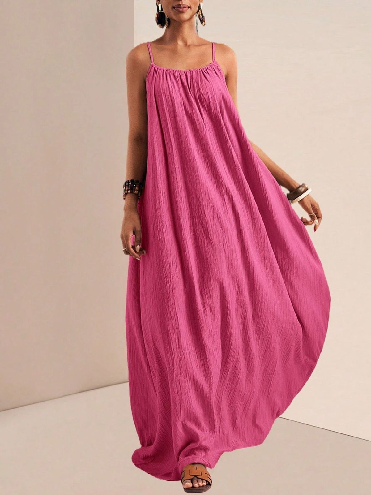 Flowy maxi dress worn with flat sandals