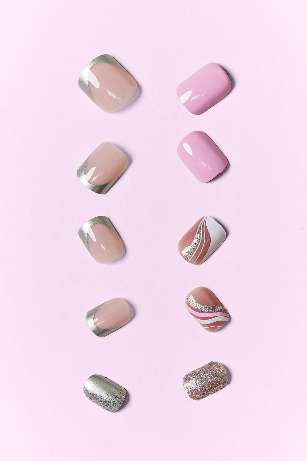Press on nails shown on both hands