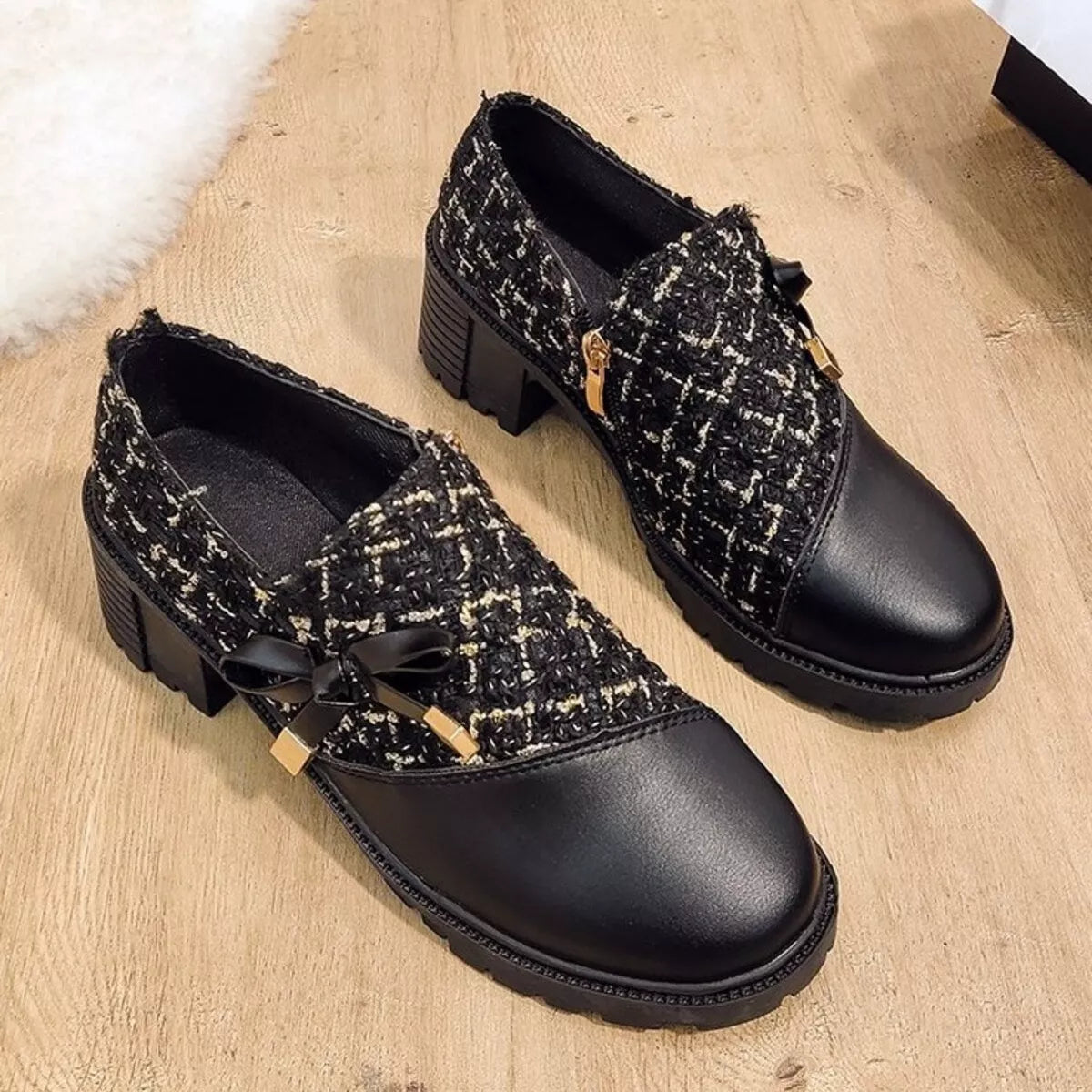 Fur trimmed round toe block heel boots lifestyle shot