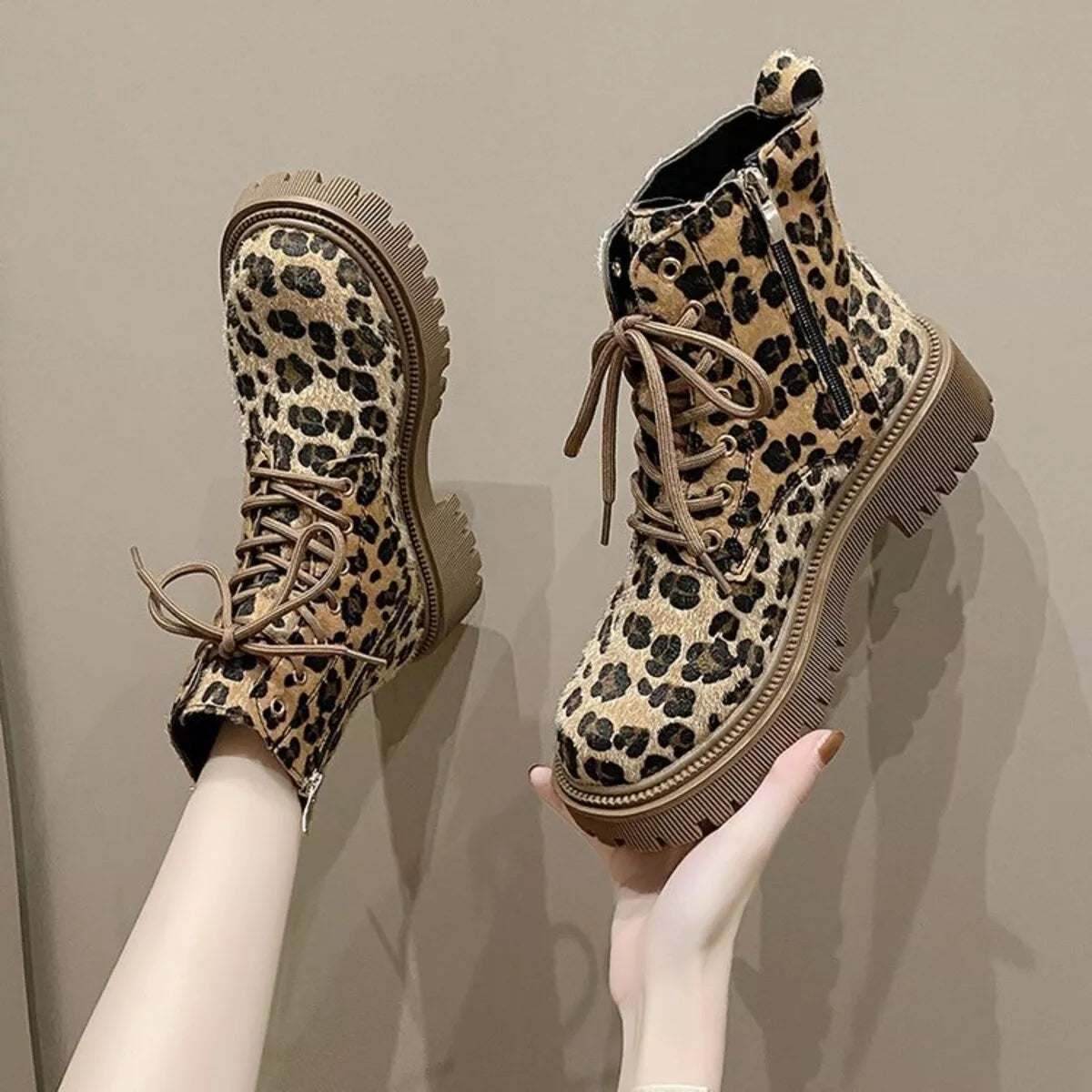 Animal print lace up ankle boots styled on model