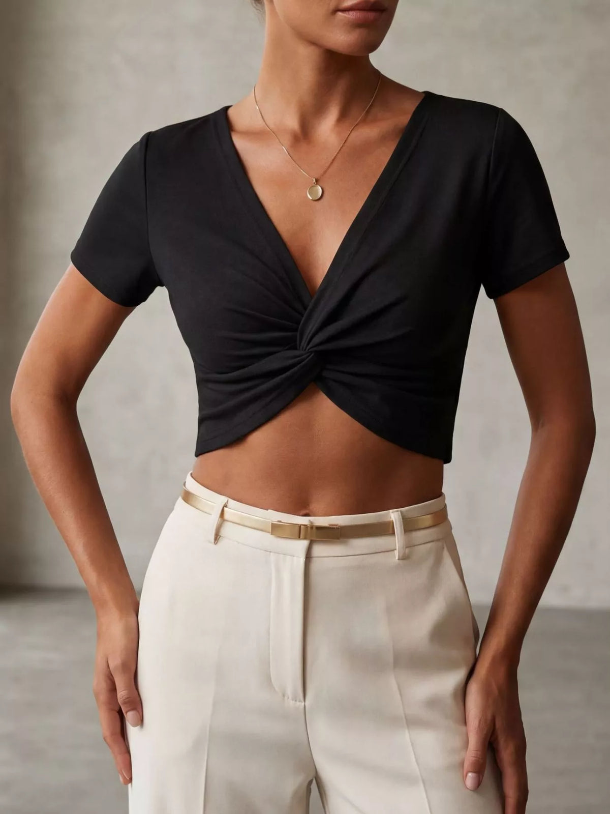 Black twist front cropped top, styled on model