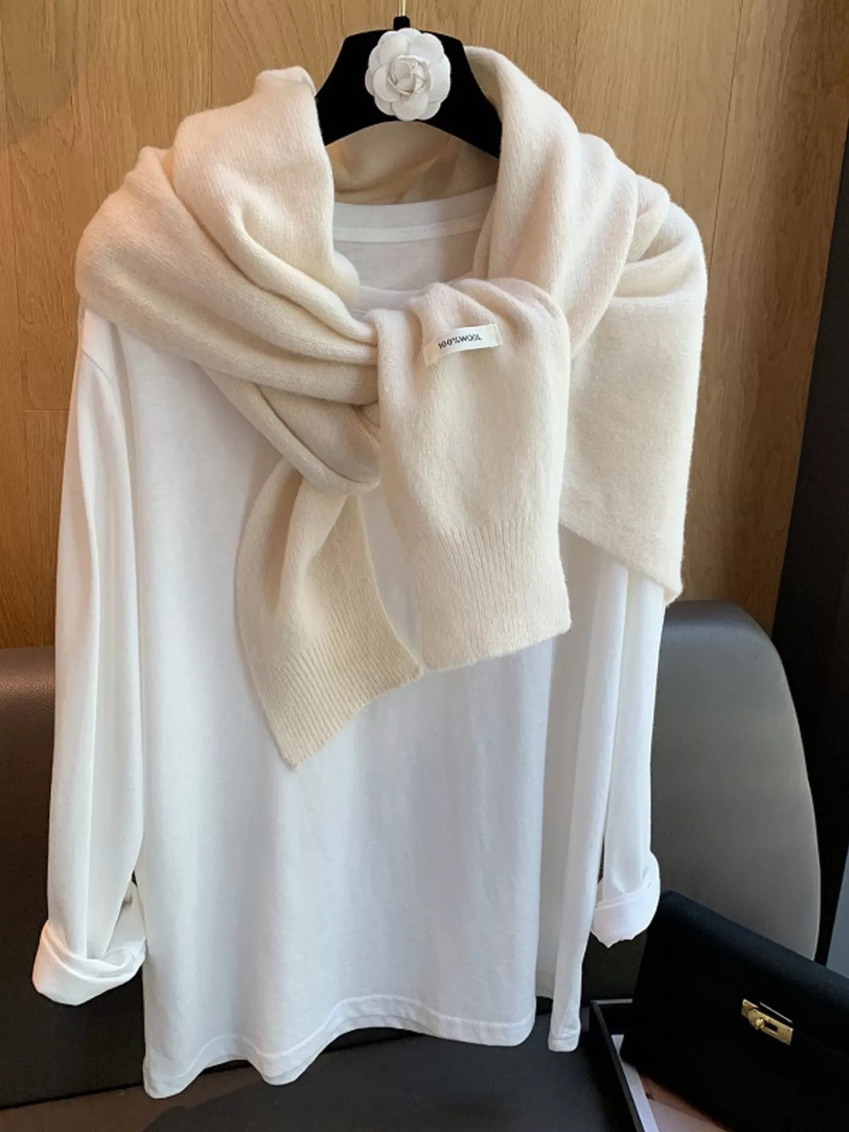 Wool knitted asymmetrical shawl draped styling