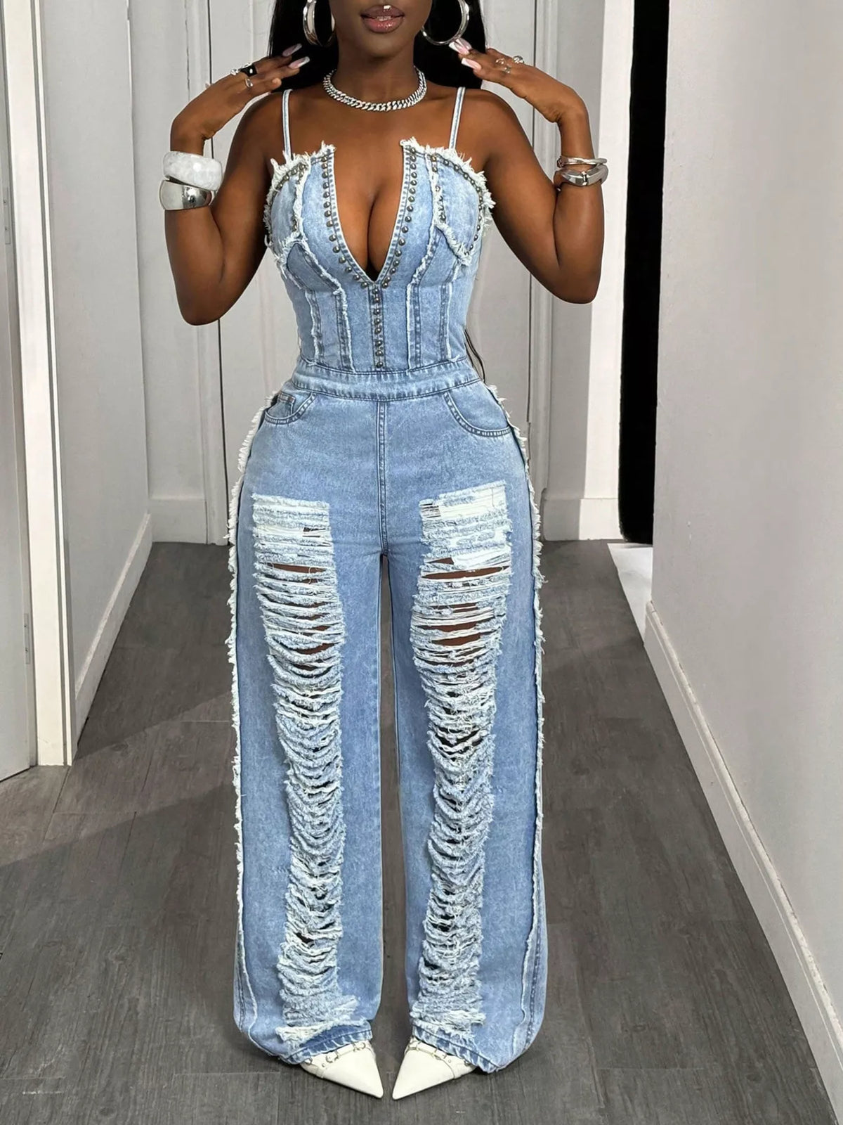 Raw hem detail on the wide leg denim jumpsuit