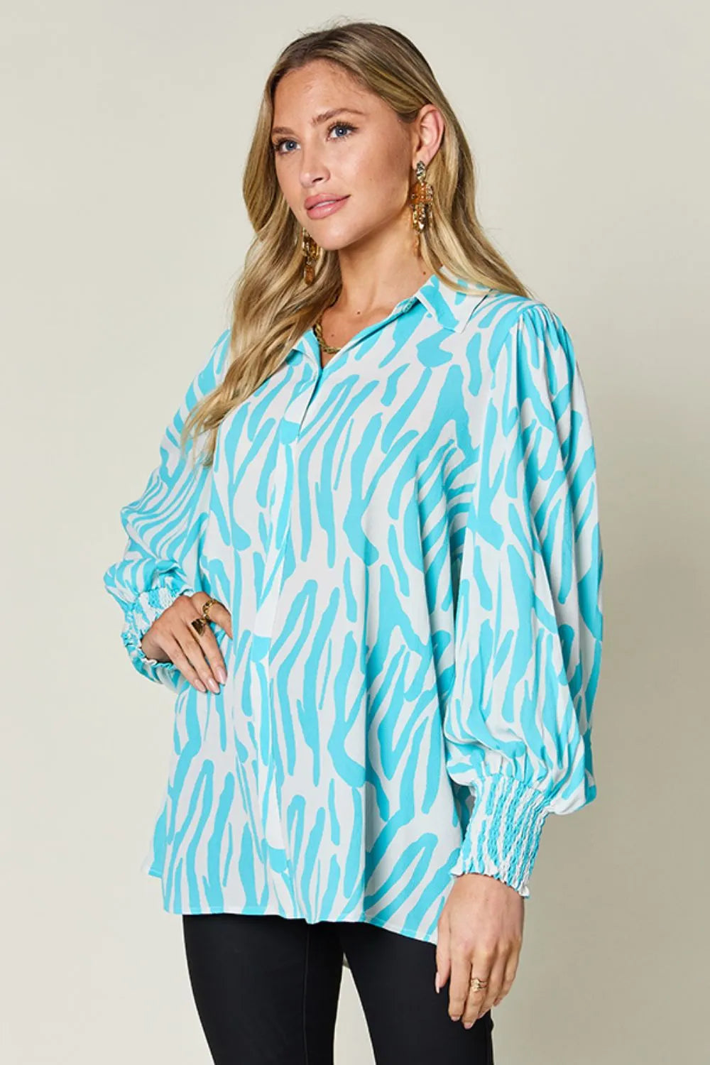 Plus size fit of the smocked long sleeve blouse