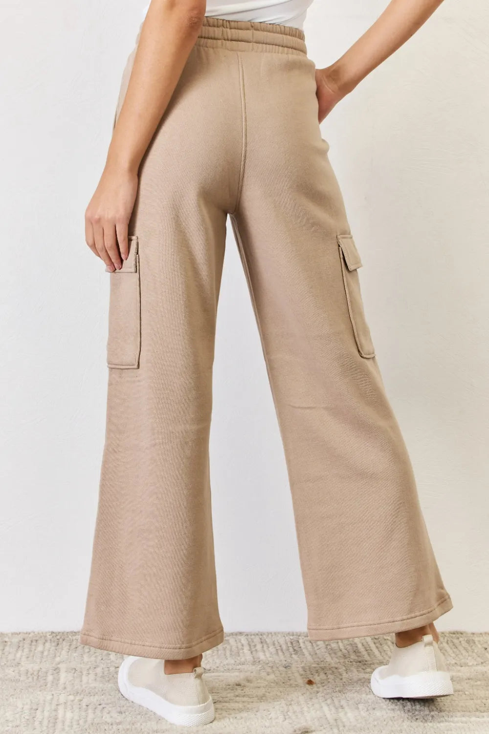 Back view of tan high waist cargo pants